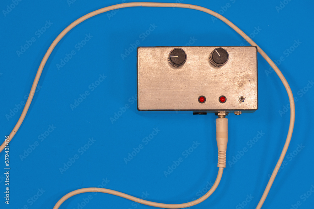 Close up of an electronic equipment with connection cable on background