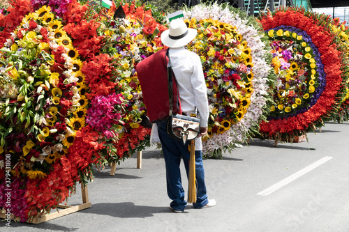 Medellin, Antioquia, Colombia. August 10, 2019: Peasant with carriel in the Silleteros Parade photo