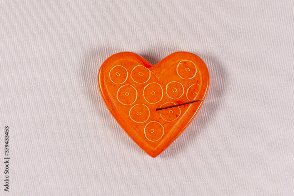 Orange heart on background with space for writing Orange heart on background with space for writing