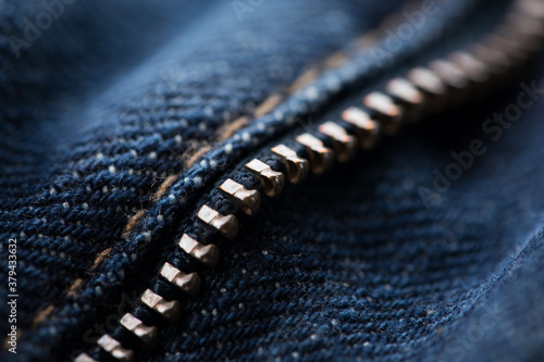 Close up of zipper on denim