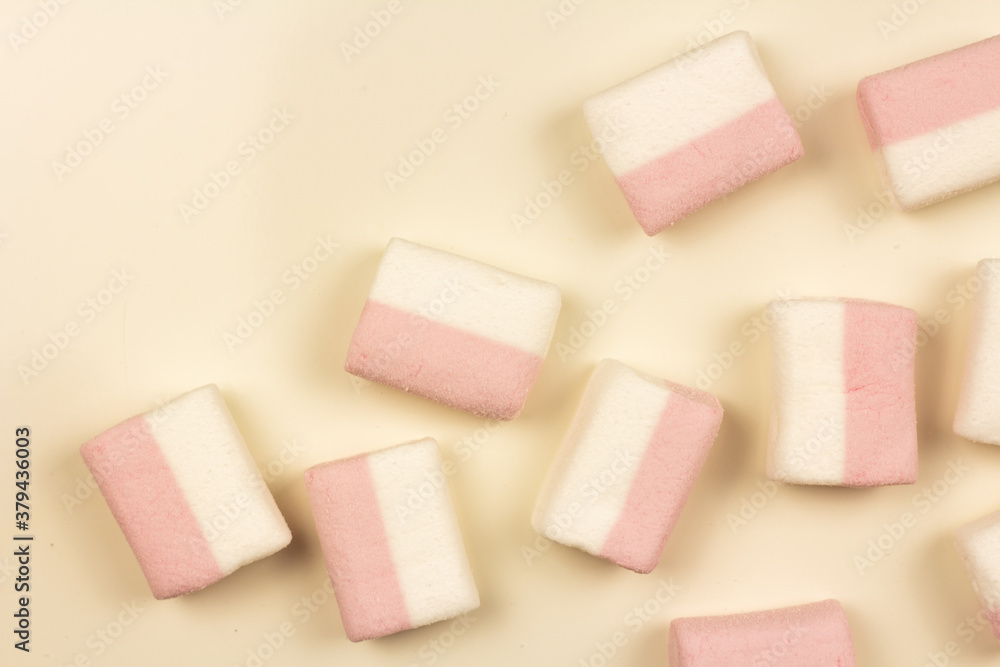 marshmallow on a pink background marshmallow on a pink background