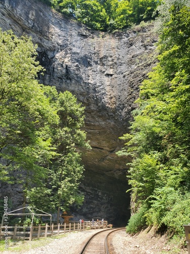 train tracks through tunnel