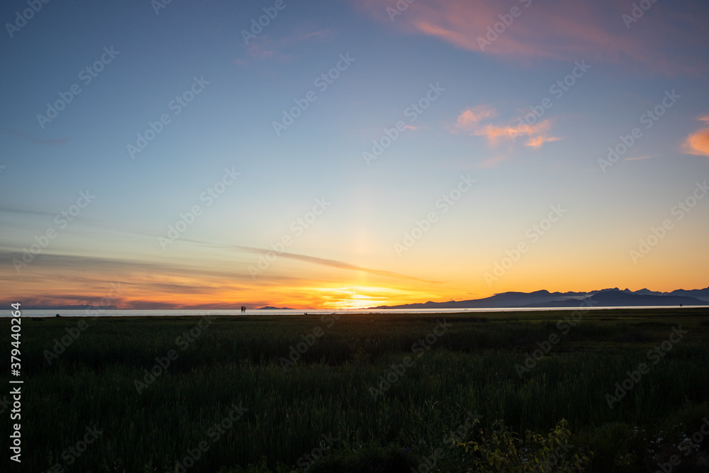 Fototapeta premium sunset over the lake