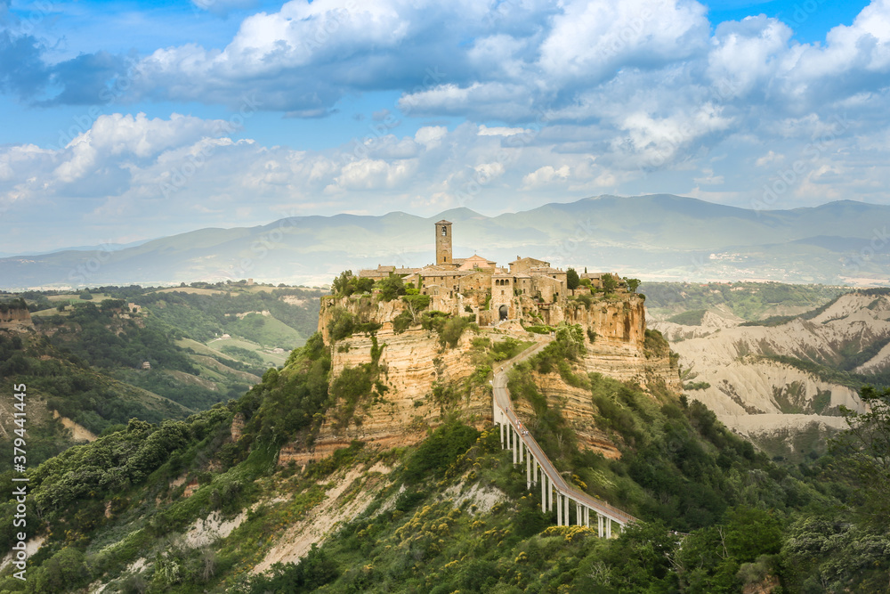 The small italian town Civita di Bagnoregio on the rock and the only bridge to it.