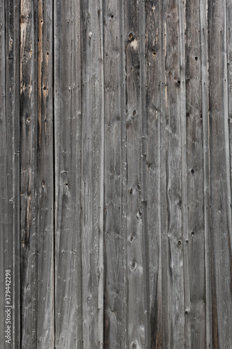 Old grey wooden background. Timber board. Grunge image. Board floor. Old rustic wooden texture.