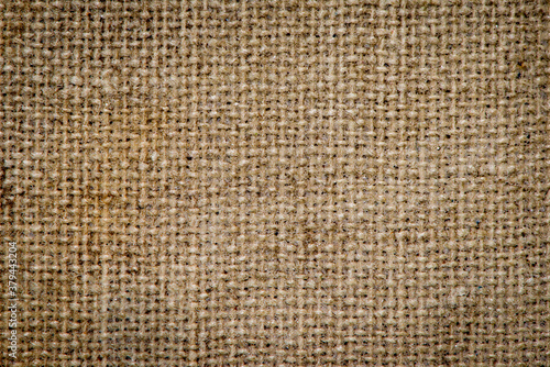 Grunge burlap sacking texture closeup photo background.