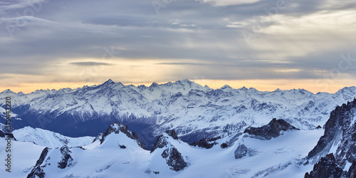 Panoramic view of the winter mountains at sunset near Chamonix in France.