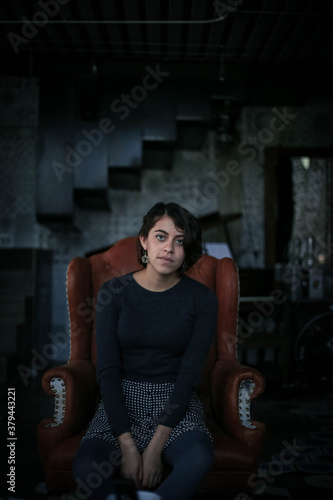 Beautiful young woman vintage couch sitting woman