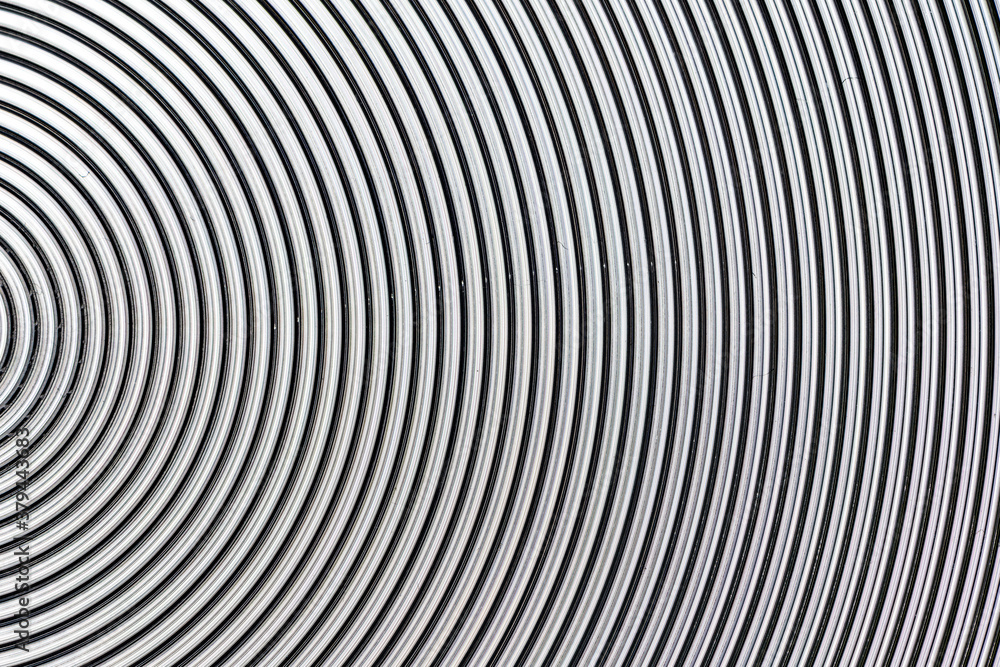 Aluminum metal surface with spiral pattern texture closeup photo background. Aluminum metal surface with spiral pattern texture closeup photo background.