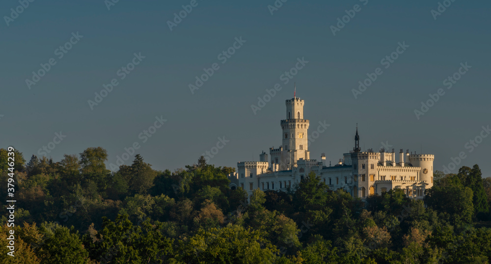 Hluboka nad Vltavou castle in sunny summer blue sky morning