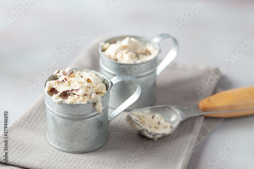 vanilla and chocolate ice cream in aluminium cup