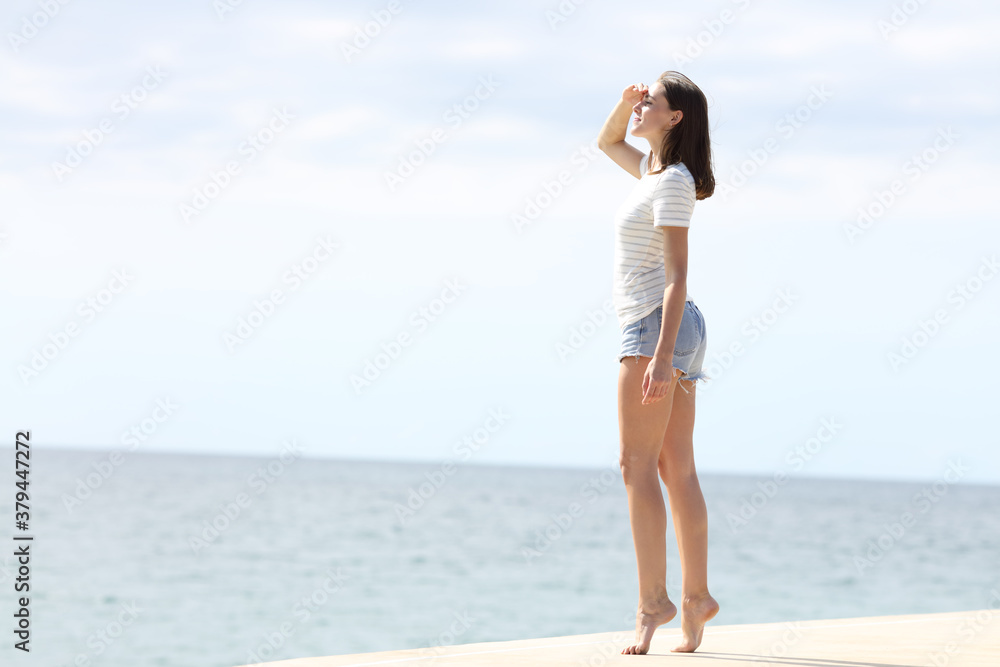 Woman with beautiful long legs looking away Woman with beautiful long legs looking away