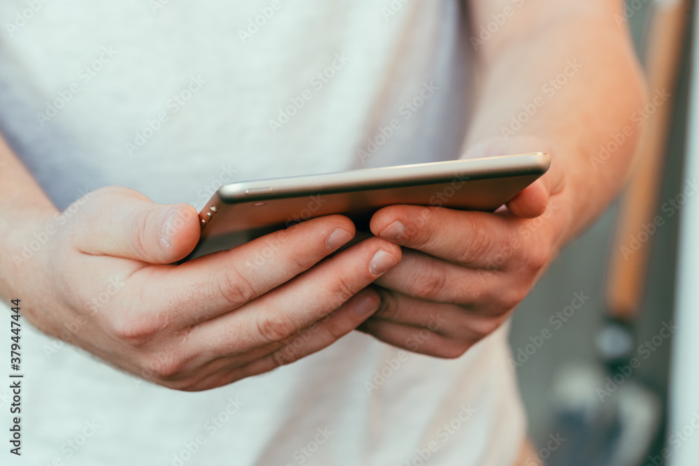 shot of male hands holding modern tablet pc mock-up outdoors shot of male hands holding modern tablet pc mock-up outdoors