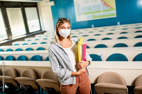 Female student wearing face...