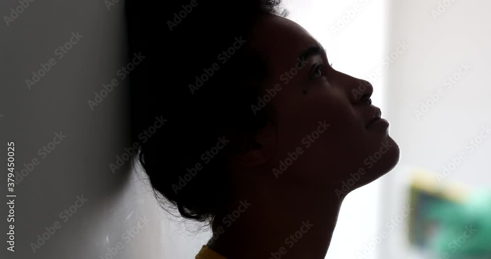 Pensive young black African woman thinking Pensive young black African woman thinking