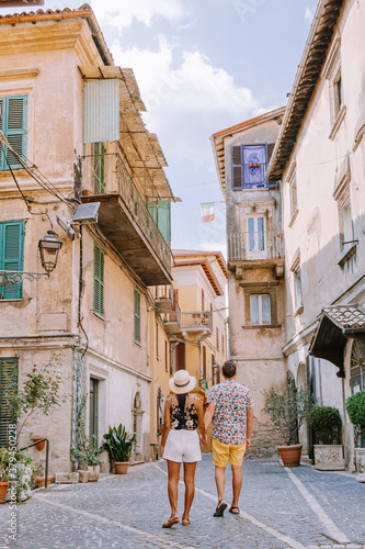 Overview of Fiuggi in Italy, Scenic sight in Fiuggi, province of Frosinone, Lazio, central Italy. Europe, couple walking on the colorful streets of Fiuggi photo