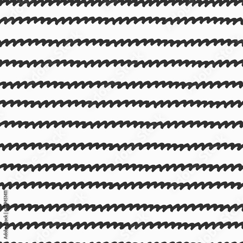 Seamless repeating monochrome pattern with hand drawn wavy lines on white background for surface design and other design projects