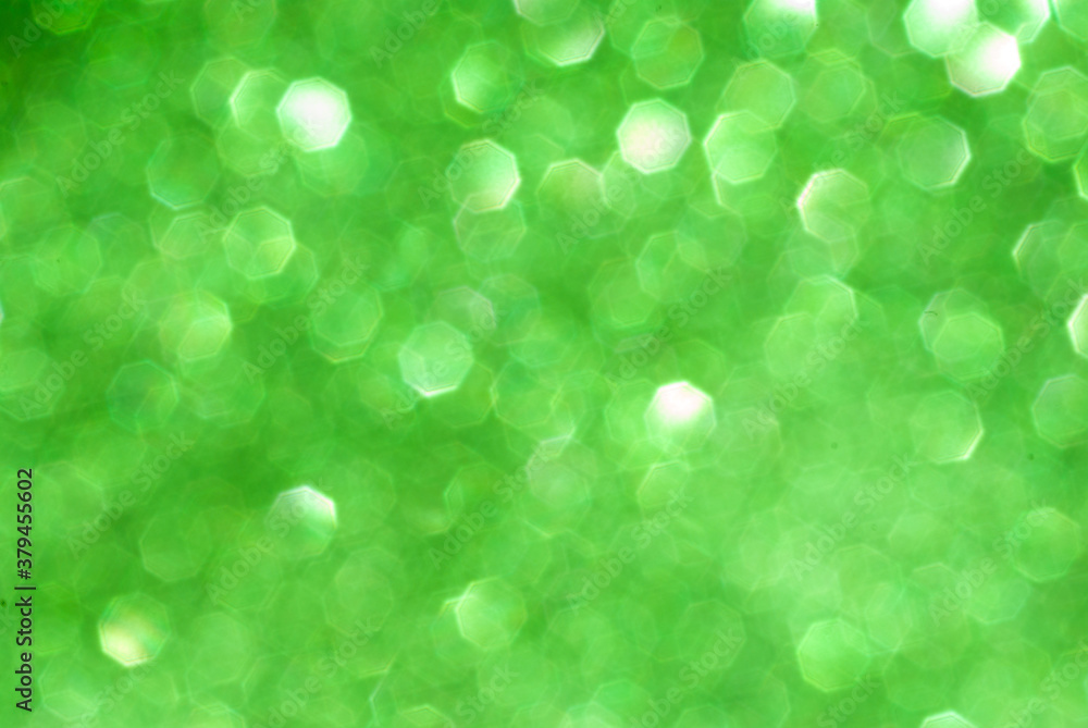 Fototapeta premium abstract green bokeh background from glitter