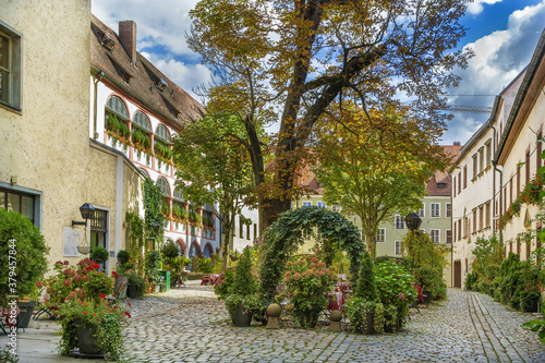 Courtyard with tree n Regensburg city center  Germany
