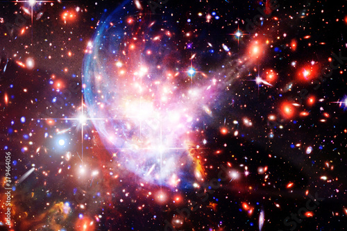 Star cluster and galaxy. The elements of this image furnished by NASA. © wowinside