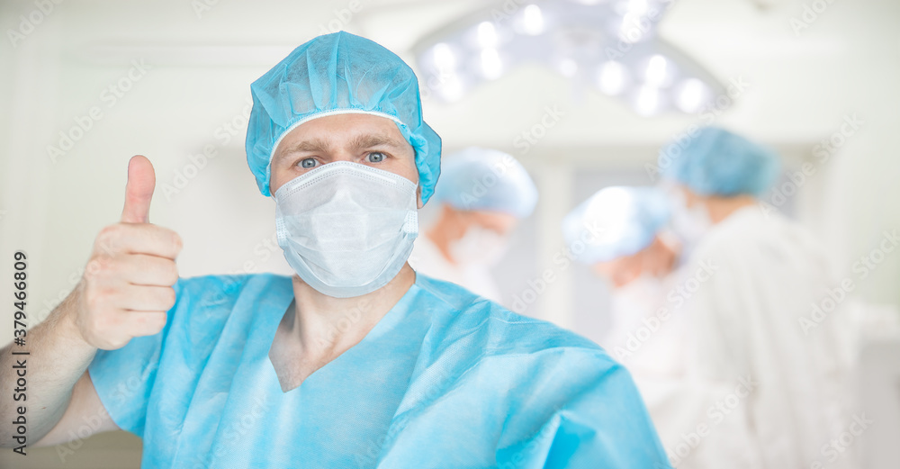 Selfie photo male doctor nurse on background of operating room with patient Selfie photo male doctor nurse on background of operating room with patient