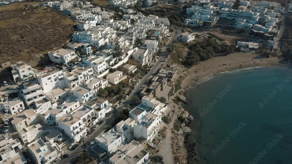 Aerial view of the pier with Paros island on a background Naousa village