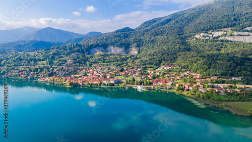 Aerial view from the drone of the landscape of a small town on the shores of lake Como  Italy.