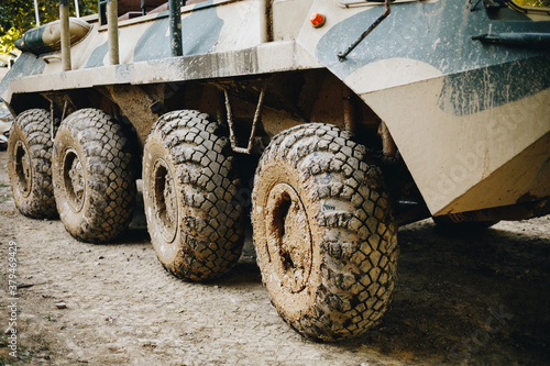 Fotografi armored personnel carrier wheels in the mud
