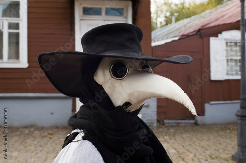 Photography Modern stylized plague doctor in leather mask