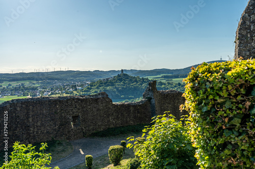 view on castle ruin vetzberg and duensberg mountain with a buitiful ladscape panorama. view  from the medieval castle ruin gleiberg near giessen, hesse, germany photo