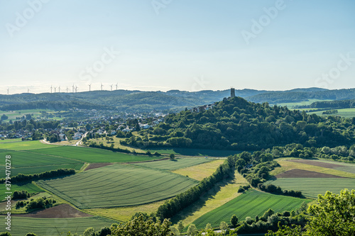 view on castle ruin vetzberg and duensberg mountain with a buitiful ladscape panorama. view from the medieval castle ruin gleiberg near giessen, hesse, germany