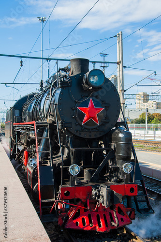 Vintage black steam locomotive. The train arrived at the station