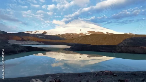 Mountain landscape with glaciers and lake near Elbrus on Caucasus, Russia