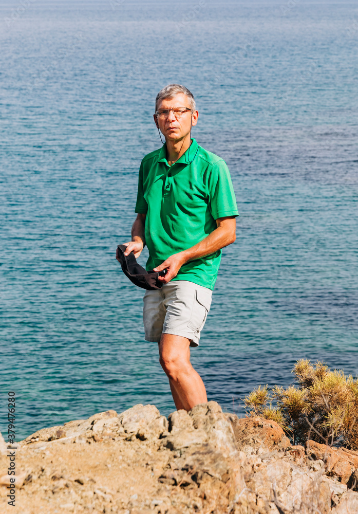 Mature man in front of Mediterranean Sea