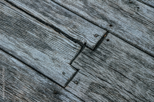 Texture of an old weathered wooden board