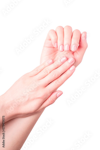 Beautiful female hands showing fresh cute manicure, skin and nail care concept, isolated