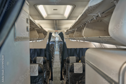 Empty airplane cabin interior without passengers in it