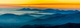 Layers of Mountains, Clouds, fog, at Sunset Panorama