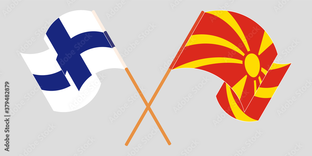 Crossed and waving flags of North Macedonia and Finland Crossed and waving flags of North Macedonia and Finland