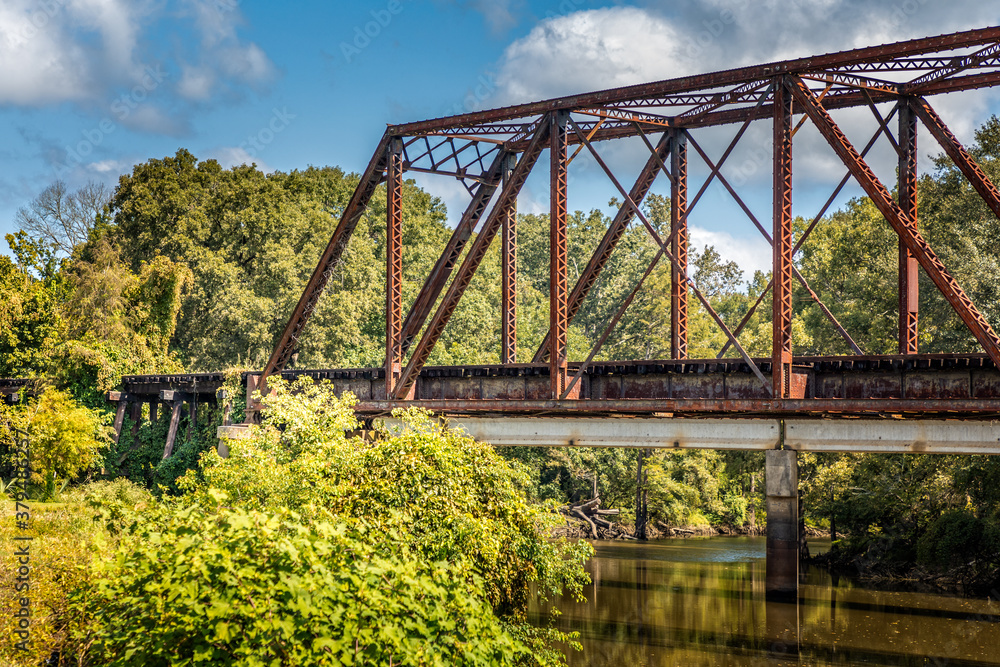 Old, historic Jefferson railway bridge in Jefferson, Texas USA Old, historic Jefferson railway bridge in Jefferson, Texas USA