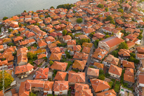Aerial view from a drone roofs of houses red-tiled in Bulgaria. Travel and vacation concept.