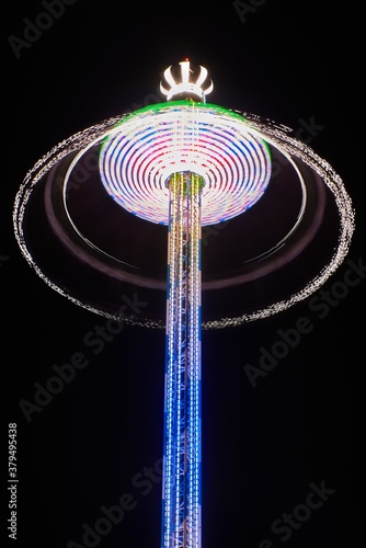 Long exposure of a carousel at night. photo