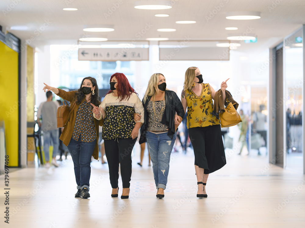 Shopping at the time Corona Virus with middle-aged Curvy Girls. Fashion  group of Plus Size