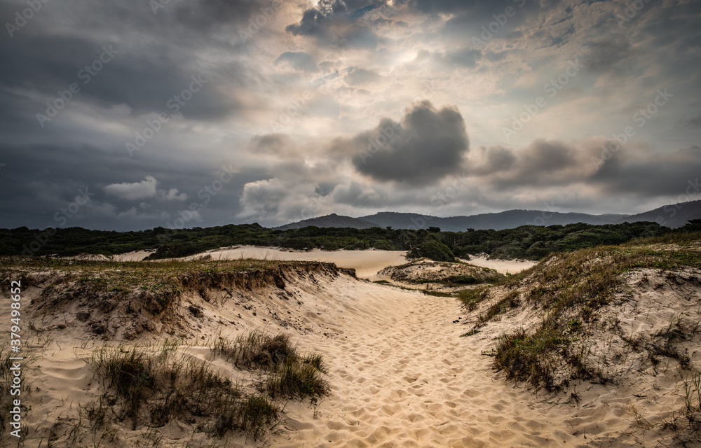 storm clouds over the sand dunes