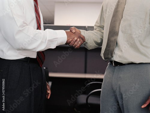 Close up of businessmen shaking hands