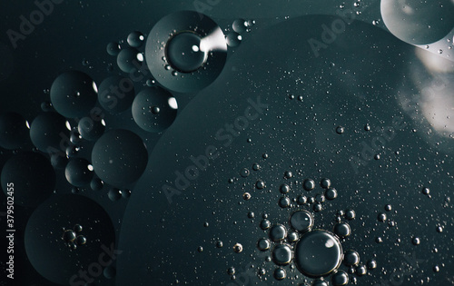 Abstract molecule sctructure. water drops on glass. background with particles. water drops on the window