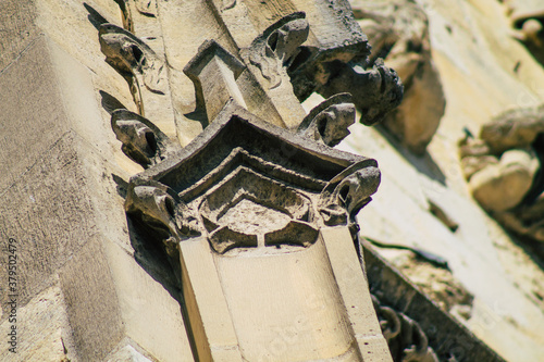 View of the exterior facade of the Basilica of Saint-Remi, a medieval abbey church in Reims, a historical monument in the Grand Est region of France 