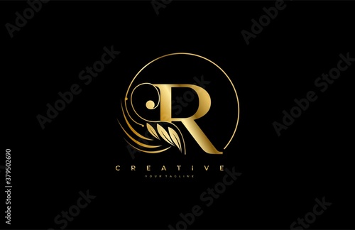Initial R letter luxury beauty flourishes golden monogram rounded shape logo