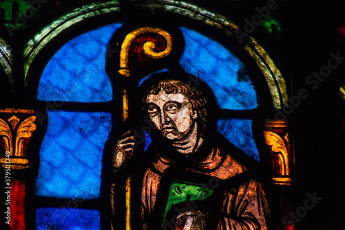 View of stained glass windows inside the Basilica of Saint-Remi, a medieval abbey church in Reims, a historical monument in the Grand Est region of France 