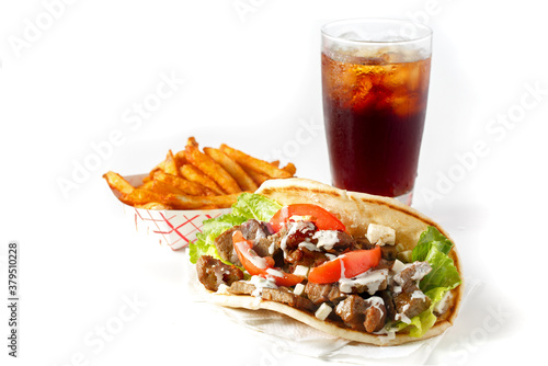 Gyro with fries and cola on a white background with copy space